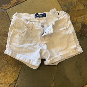 White jean Hollister shorts.